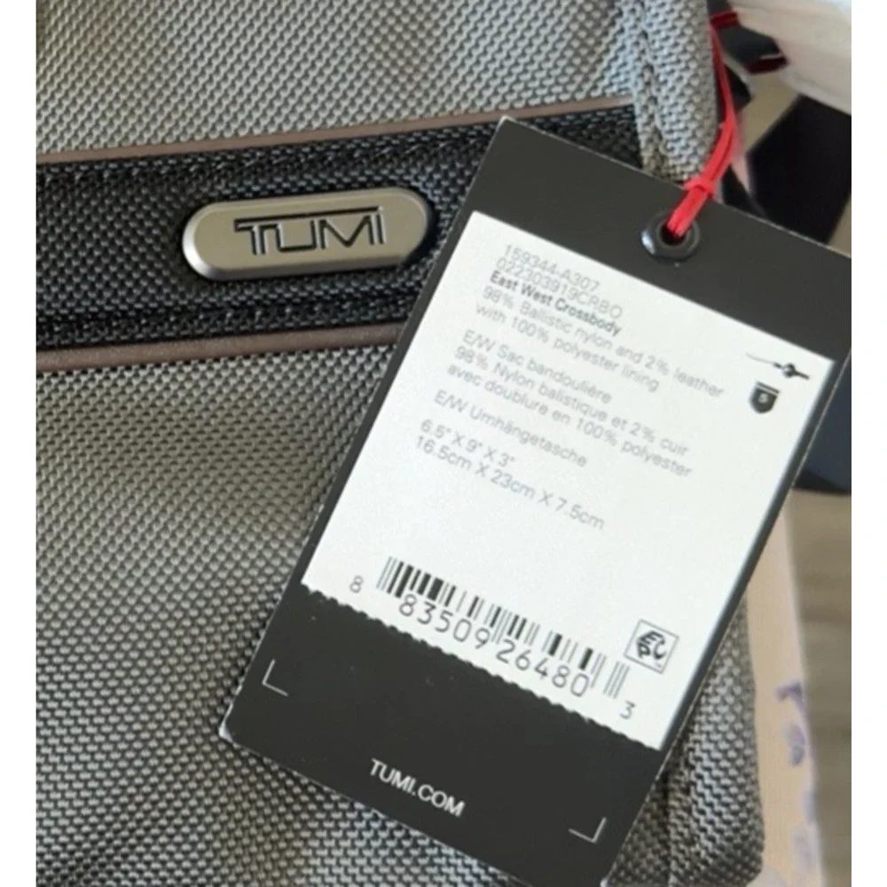 NEW Tumi GEN 4.3 EAST WEST 9.0” Sling Crossbody - CASTLEROCK GRAY & BROWN
